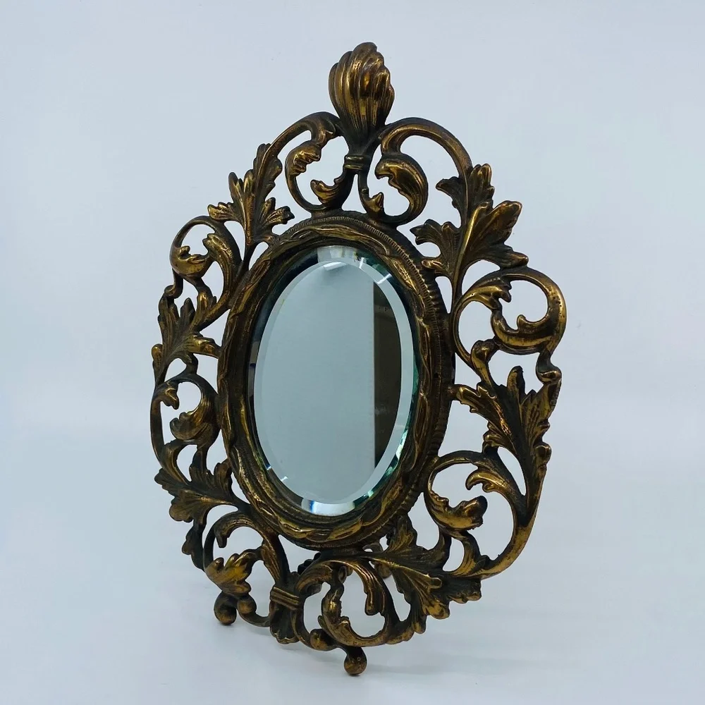 Antique Bronze Ornate Free Standing Beveled Mirror.